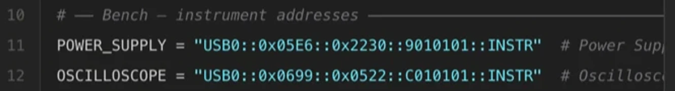 Generated Python defining POWER_SUPPLY as the VISA resource string USB0::0x05E6::0x2230::9010101::INSTR and OSCILLOSCOPE as USB0::0x0699::0x0522::C010101::INSTR, each with a trailing comment naming the instrument.